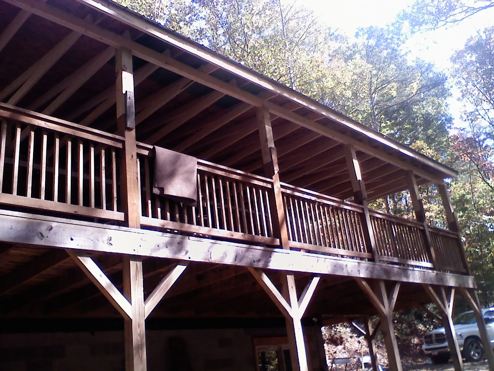 Timber framing under a new elevated porch and deck — Roof Leak Repair in Emerson by Roofing Brothers